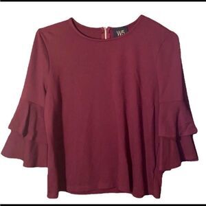 20.
NWOT W5 Anthropologie 3/4 Tiered Ruffle Sleeve Exposed Zipper Top Size M